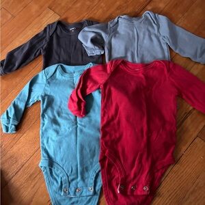 Carter's 4-Pack Long-Sleeve Bodysuits in Red, Teal, Light Gray, and dark Grey